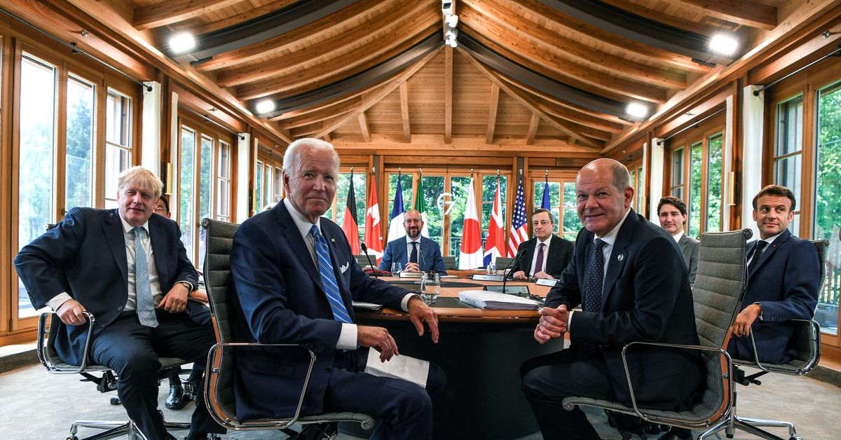 US President Joe Biden attends a working lunch with other G7 leaders. Photo: Reuters